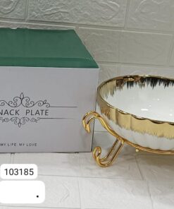 Ceramic bowl with golden stand