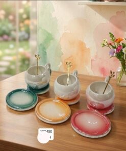 Ceramic cap and saucer with steel spoon